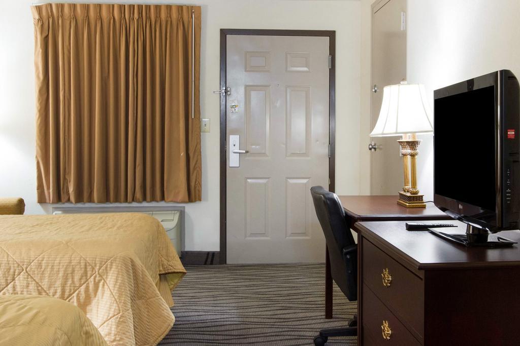 Executive Inn And Suites Enterprise Buitenkant foto